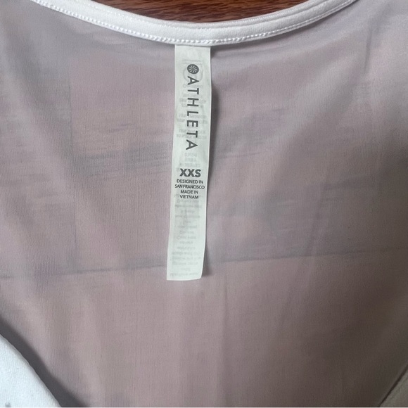 Athleta Women’s white size XXS, athletic top with detailing and sheer back - Picture 2 of 4